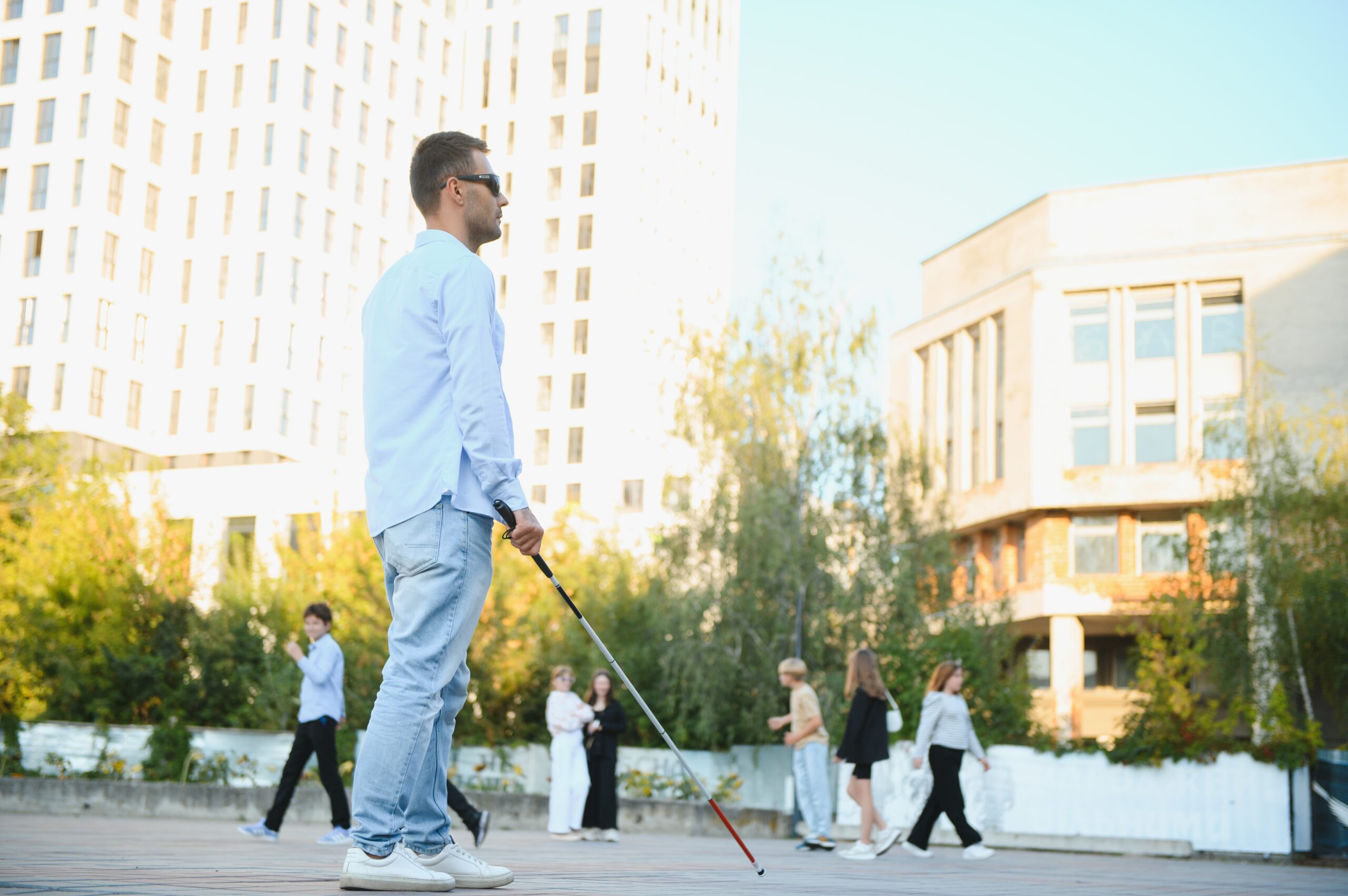 Portrait of a young, professional blind man walking in the city. By sedrik2007